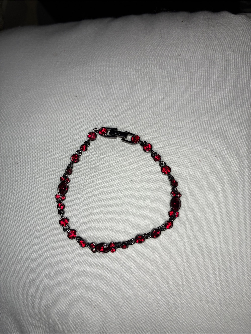 Elegant Women’s Red Crystal Chain Bracelet in gun metal tone